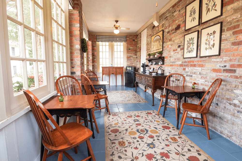 A relaxing space to enjoy morning coffee or tea: The ample natural light and comfortable chairs make it an ideal spot to unwind and start the day.